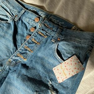 Free People ripped jeans with a button fly, Size 27